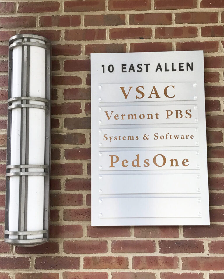 10 East Allen Directory A building directory sign at 10 East Allen lists VSAC, Vermont PBS, Systems & Software, and PedsOne.