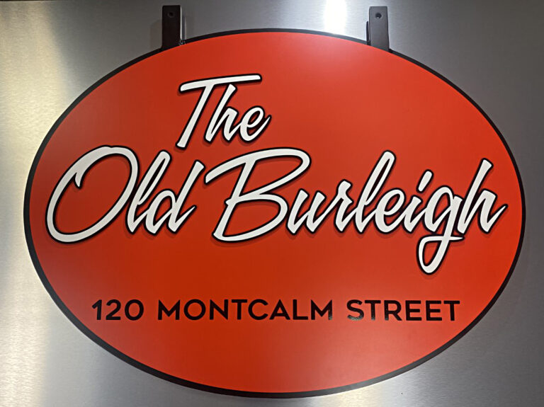The Old Burleigh Raised Letters Red oval sign with white script reads "The Old Burleigh, 120 Montcalm Street" on a metallic background.