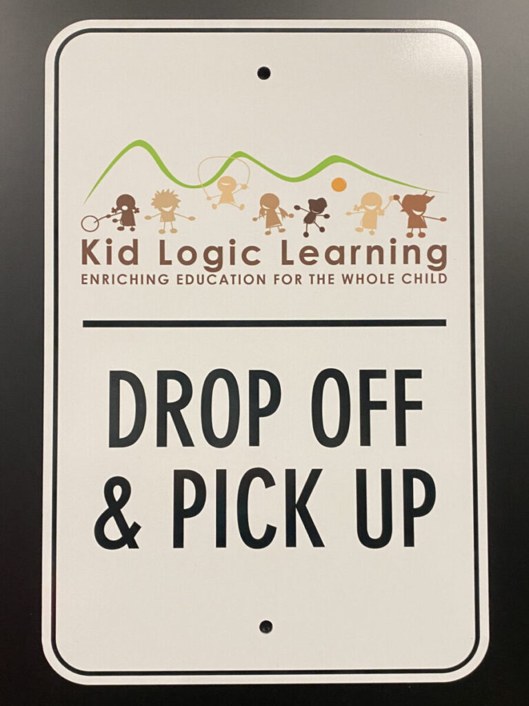 Kid Logic Learning Signage A sign on a wall.