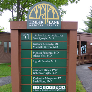 Timber Lane Medical Center Wayfinding Outdoor directory sign for Timber Lane Medical Center listing doctors and staff at 51 Timber Lane, with trees in the logo.