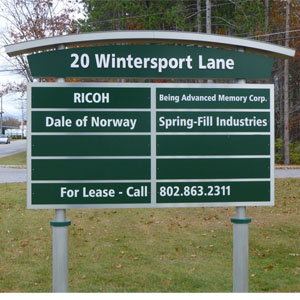 20 Wintersgate Lane Directory A green business directory sign at 20 Wintersport Lane lists several company names and a 'For Lease' contact number.